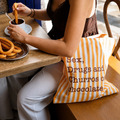 Tote bag de rayas con mensaje Sex, drugs and churros con chocolate