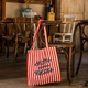 Tote bag de rayas con mensaje Siesta y después fiesta